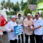 Bupati James Uang Menyerahkan Bantuan Pembangunan Rumah Ibadah
