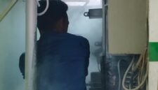 Salah Satu Petugas Damkar Menangani Kebakaran di Gardu Listrik