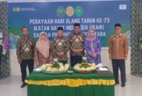 Persiapan Pemotongan Tumpeng Dalam Perayaan HUT Ikatan Hakim Indonesia Malut