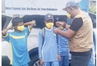 Pembagian Masker Kepada Siswa Yang Dilaksanakan BPBD Halmahera Barat
