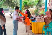Pembagian Masker Yang Dilakukan BPBD Halmahera Barat
